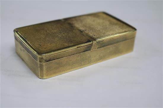 A George IV engine turned silver gilt double lidded snuff box by John Linnit, London, 1822, 71mm.